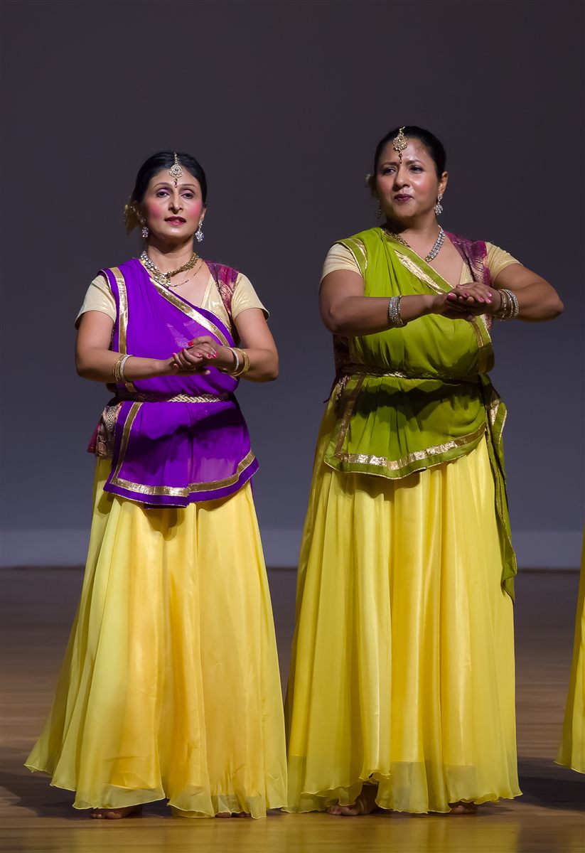 Aarti Gupta and Sapna Adhikari performing Kathak in yellow and purple lehengas